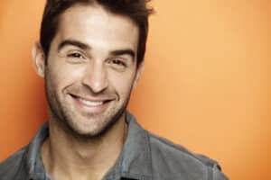 Man with healthy eyes after eyelid twitching treatment in Providence, RI